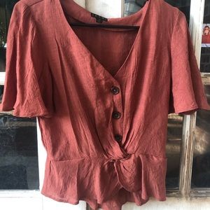 Burnt orange short sleeved shirt